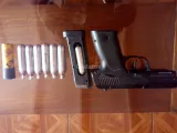 pistola de cazador