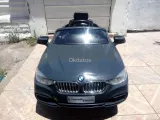 Auto Gris BMW con Control Remoto
